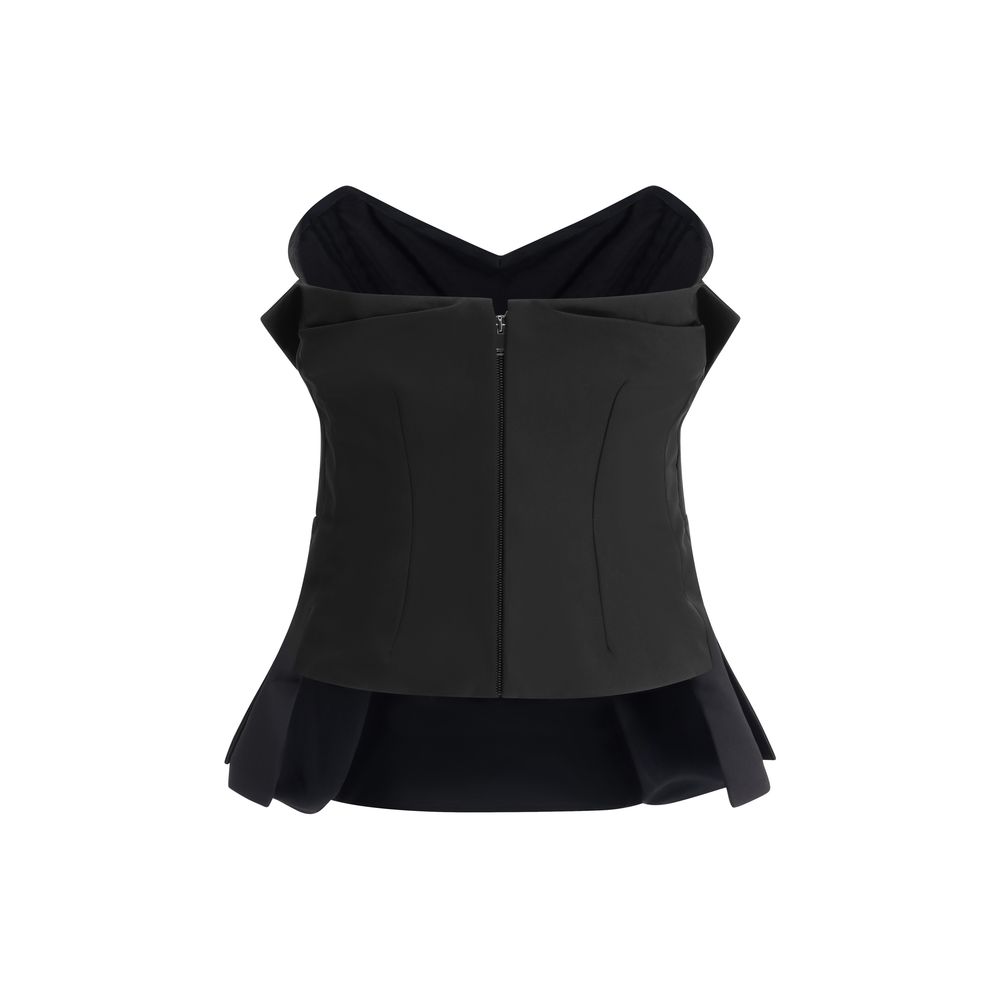 Alexander McQueen Black Polyester Top with fitted silhouette and bow, featuring a wide peplum and back zipper closure.
