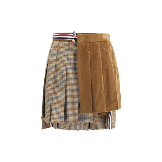 Thom Browne Brown Wool Mini Skirt with velvet and houndstooth layers, featuring side pockets and iconic striped band.