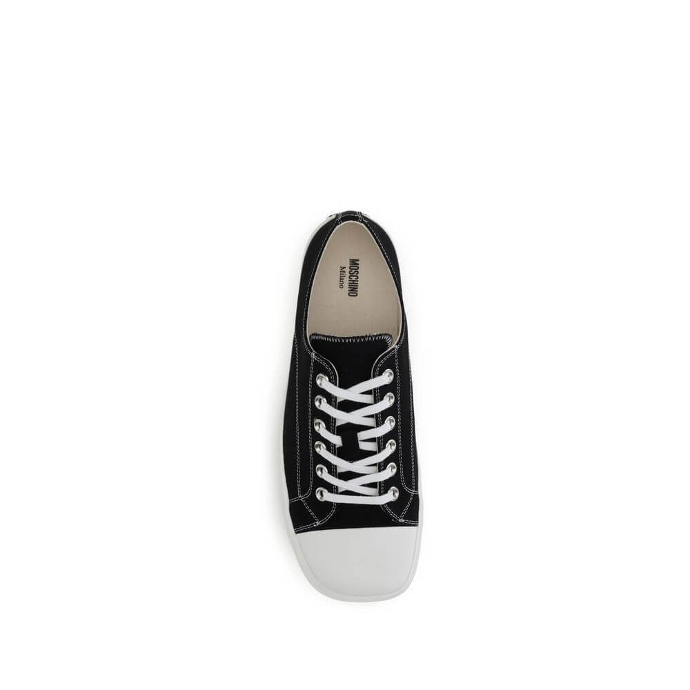 Moschino Black Cotton Low Top Sneakers with lace-up closure and reinforced toe for durability, featuring logo on heel.