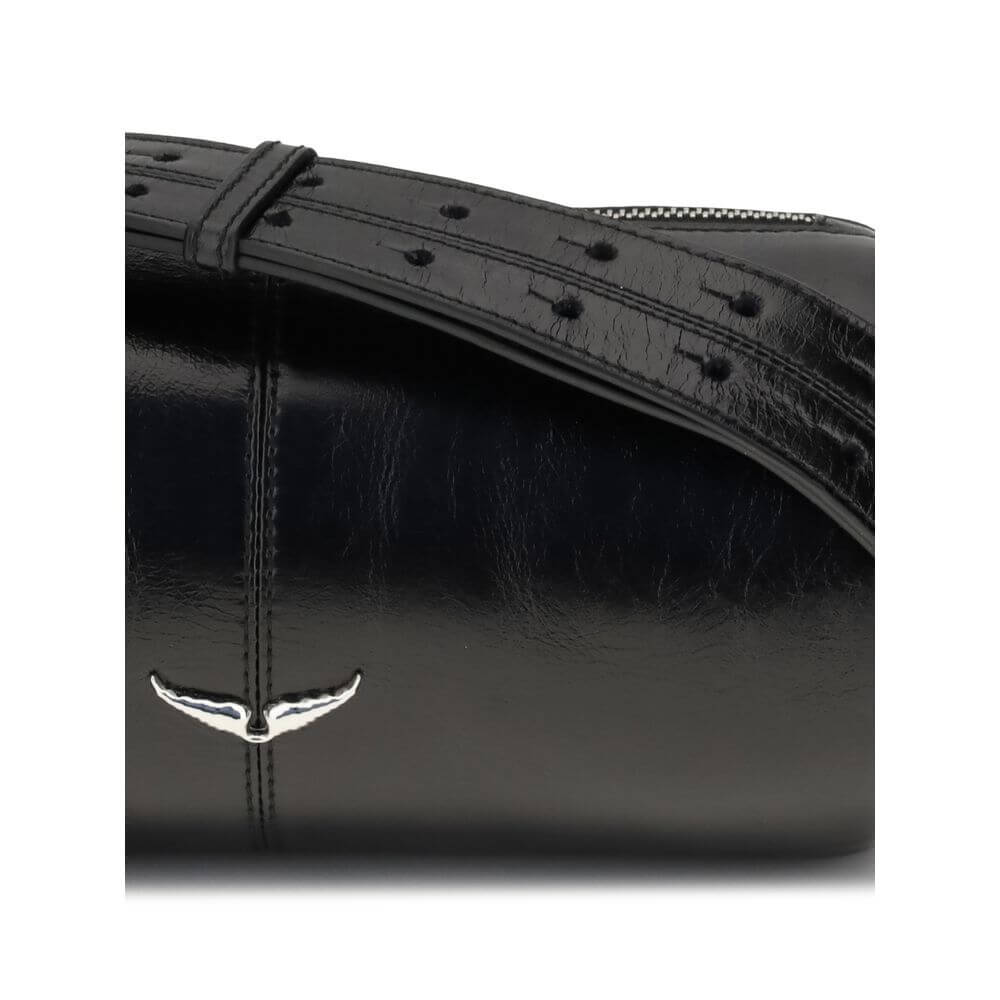 Close-up of Zadig & Voltaire Black Leather Shoulder Bag showing silver logo and glossy leather finish.