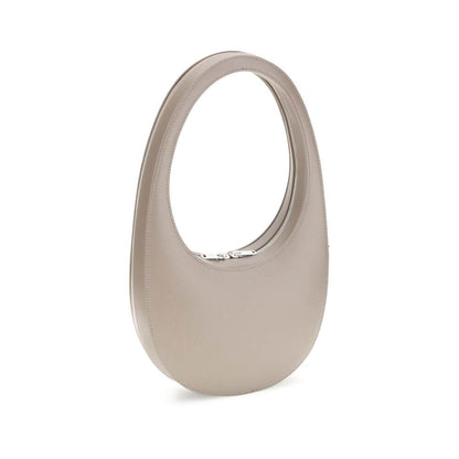 Coperni Beige Leather Shoulder Bag with unique design, hobo silhouette, top zip closure, spacious interior, and adjustable strap.