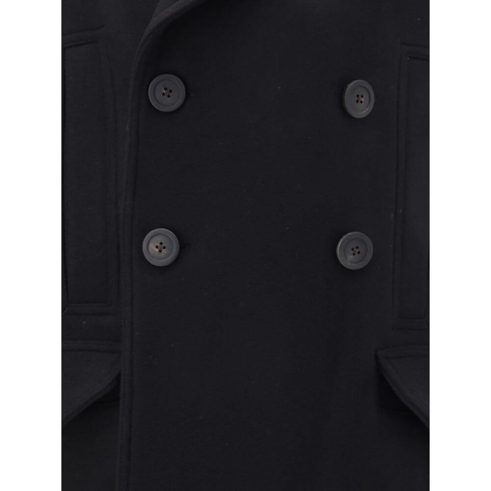 Rick Owens Black Fleece Wool Coat with double-breasted buttons, wide lapels, and welt pockets, showcasing structured elegance for AW25.
