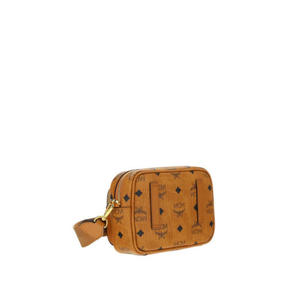 MCM Brown Cotton Shoulder Bag with monogram print, gold-tone details, adjustable strap, and top zipper closure.