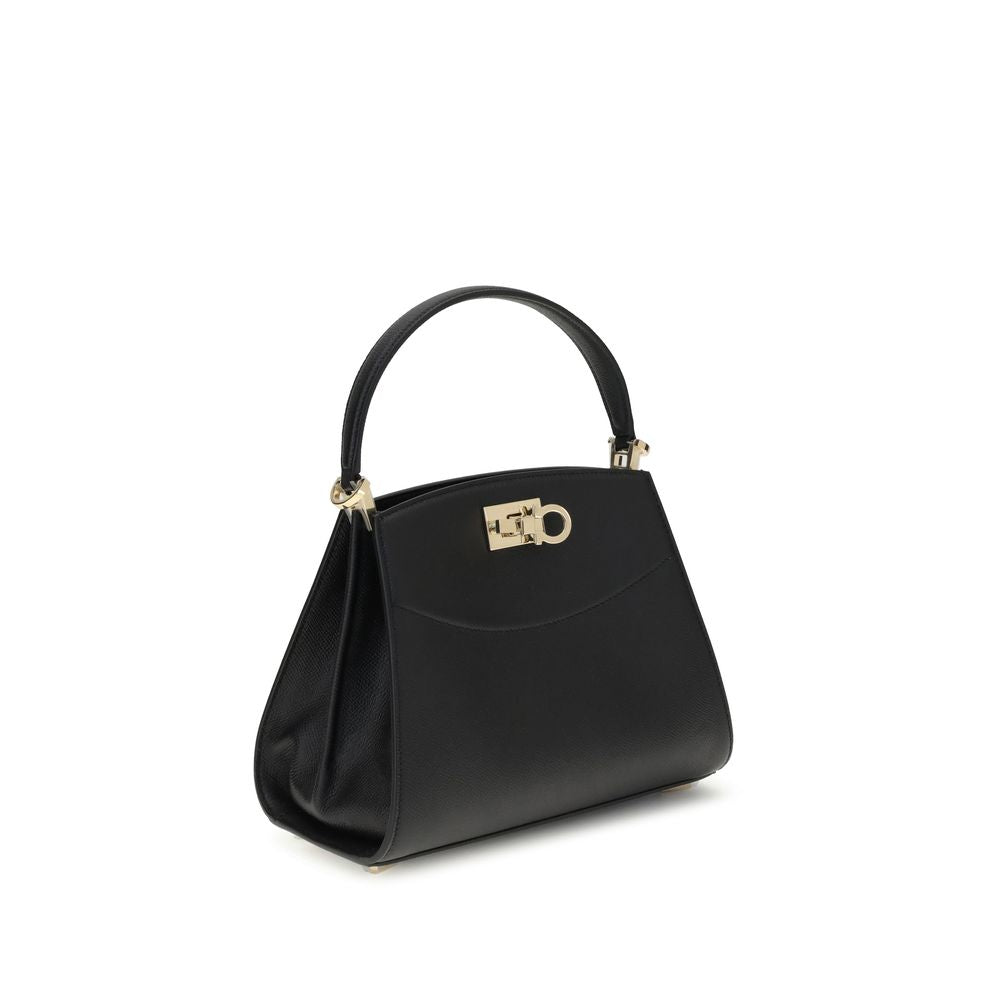 Front view with bag zipped and handles upright.
