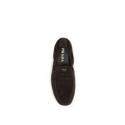 Prada Brown Lamb Ovis Aries Aries Slip-On Loafers top view showcasing suede with leather horsebit upper and rubber sole.