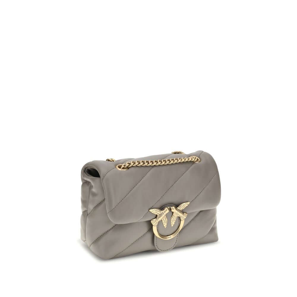 Front view with bag zipped and handles upright.