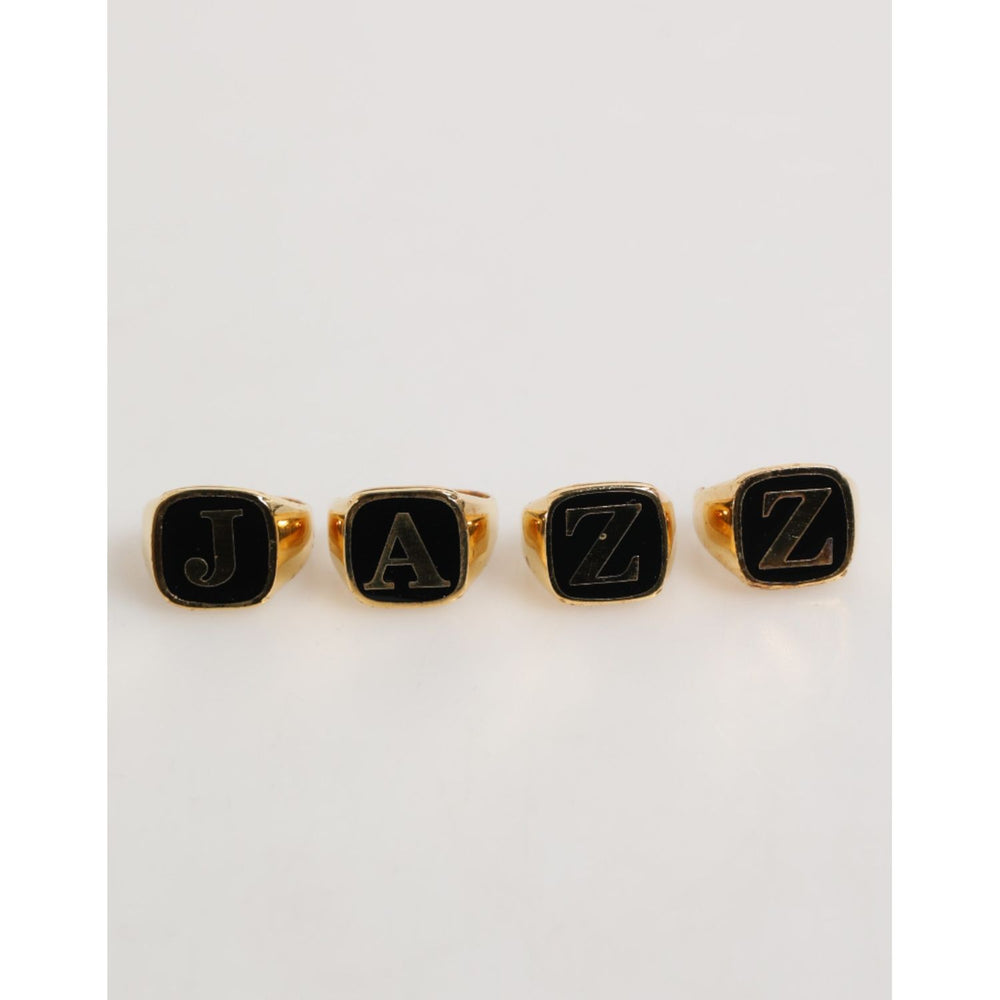 Dolce & Gabbana Gold Tone Brass JAZZ Letter Set 4 Pieces Adjustable Ring, luxury statement rings for music lovers.