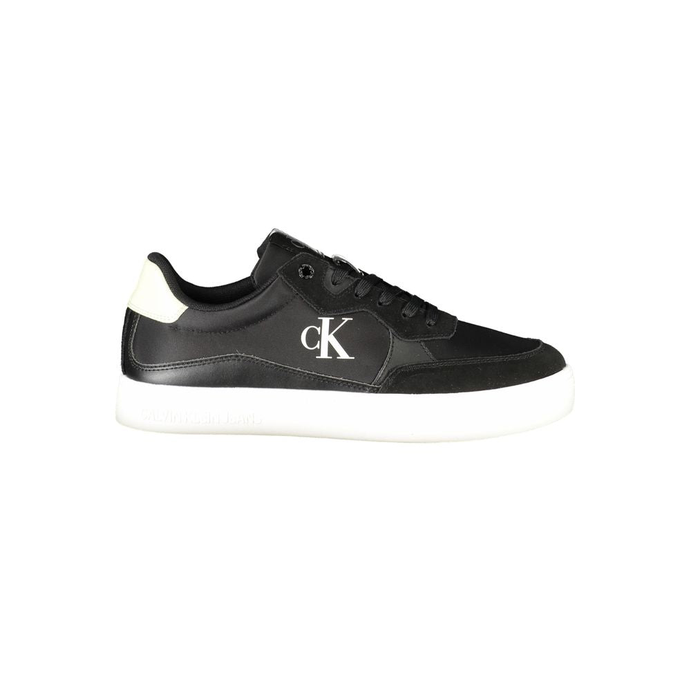 Calvin Klein Black Leather Men Sneaker with logo and contrasting white sole, designed for comfort and style.