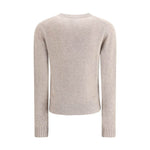 Back view of Allude Cashmere Sweater featuring ribbed crew neck, cuffs, and hem for a timeless winter wardrobe classic.