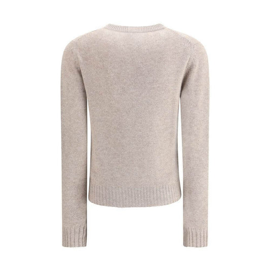 Back view of Allude Cashmere Sweater featuring ribbed crew neck, cuffs, and hem for a timeless winter wardrobe classic.