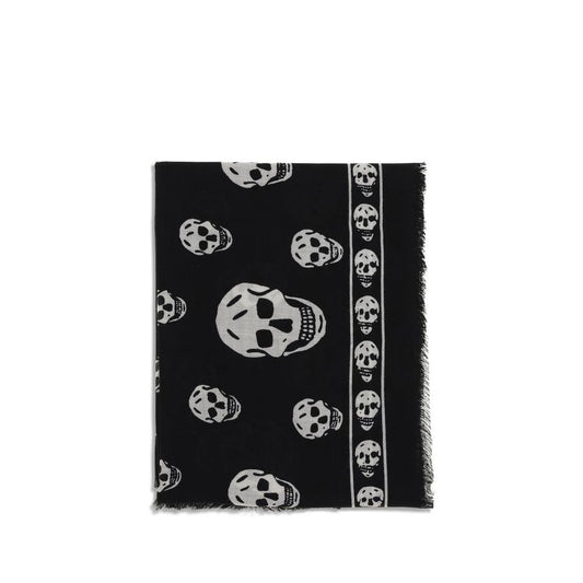 Alexander McQueen Black Modal Scarf with skull motif and fringed edges, crafted from silk and modal blend, showcased flat on white background.
