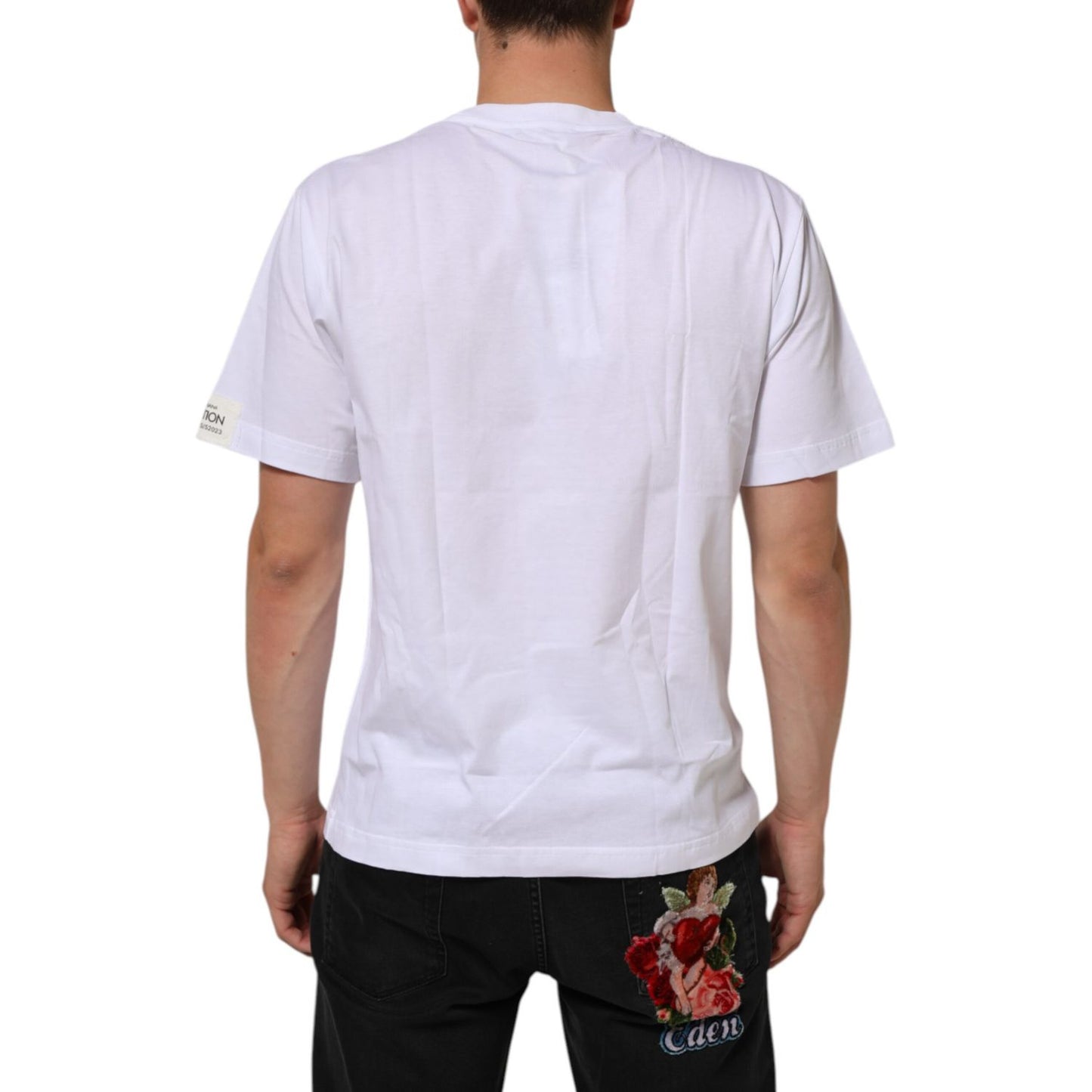 Back view of a Dolce & Gabbana White Graphic Print Cotton Crew Neck T-shirt showcasing plain back design, worn by a model.