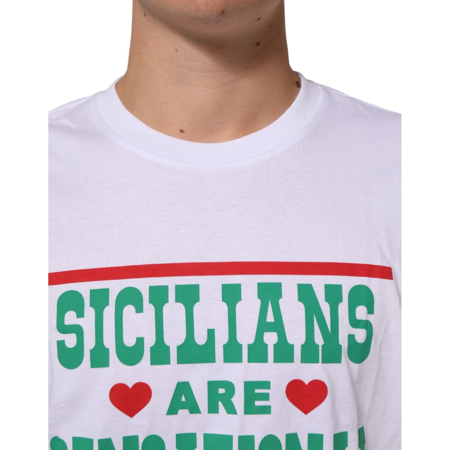 Dolce & Gabbana White Graphic Print Cotton Crew Neck T-shirt with 'Sicilians Are Sensational' slogan, close-up view.