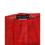 Close-up of Dolce & Gabbana Red Logo Lace Tight Midi Trousers Underwear showcasing delicate lace and logo detail.