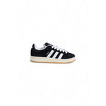 Adidas Black Suede Leather Sneaker with iconic three stripes and rubber sole, perfect for casual wear.
