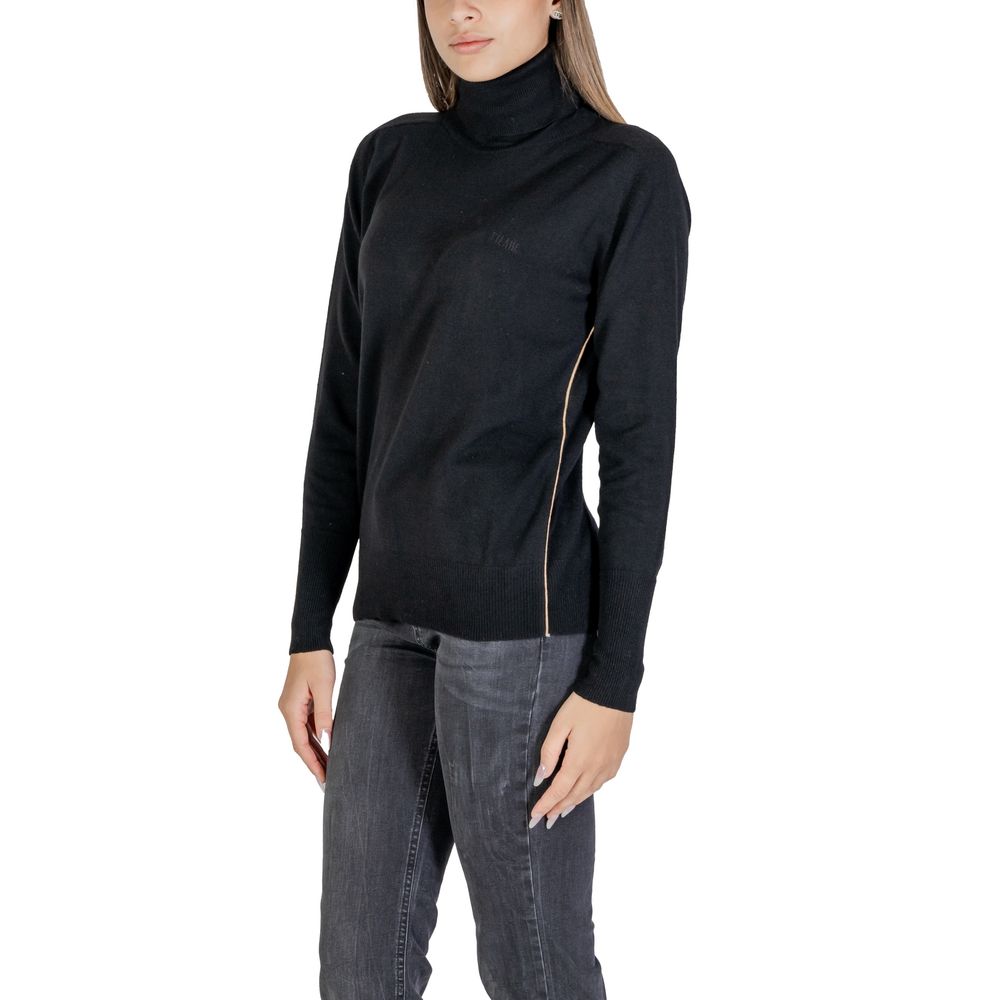 Woman wearing Alviero Martini Prima Classe Black Viscose Turtleneck, stylish and warm sweater for cold seasons.