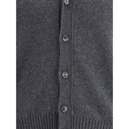 Buttoned front of the Ami Paris Gray Cashmere Cardigan with ribbed cuffs for a refined design and embroidered Ami De Coeur logo.