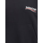 Balenciaga Logoed Hoodie with iconic monogram print. Featuring a front pocket and contemporary streetwear style. Perfect for fashion enthusiasts.