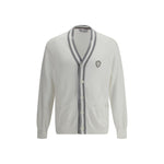 Brunello Cucinelli Cotton Cardigan with V-neck, front pockets, and unique monogram patch, perfect for elegance and practicality.