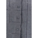 Close-up of Brunello Cucinelli Linen Shirt with monochrome pattern, featuring buttons and textured fabric details, made in Italy.