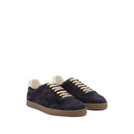 Brunello Cucinelli Suede sneakers, dark blue suede upper, leather detail, flat laces, rubber sole, round toe.