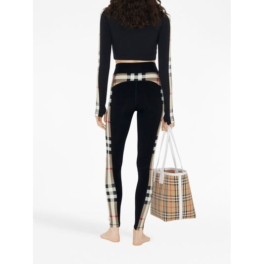 Back view of Burberry Stretch jersey leggings with Check finishes in black with Vintage Check details and elasticated waistband.