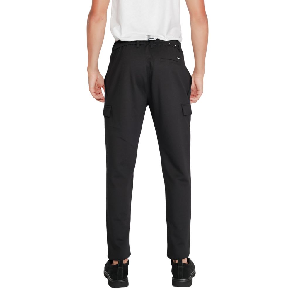 Calvin Klein Black Recycled Polyester Joggers (Workout Pants) featuring sustainable materials, shown from the back with a modern fit.
