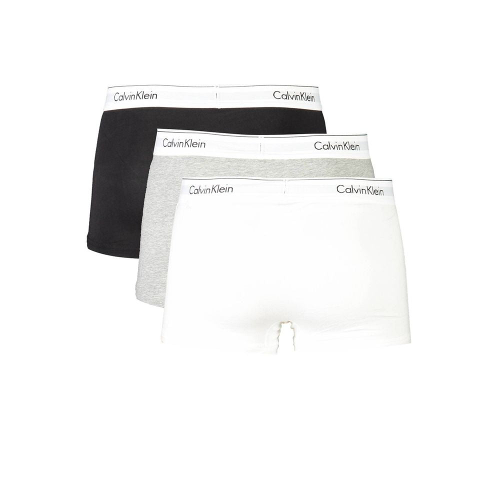 Calvin Klein Brown Cotton Men Boxer tri-pack with logo waistband, eco-friendly fabric in versatile colors for modern style.
