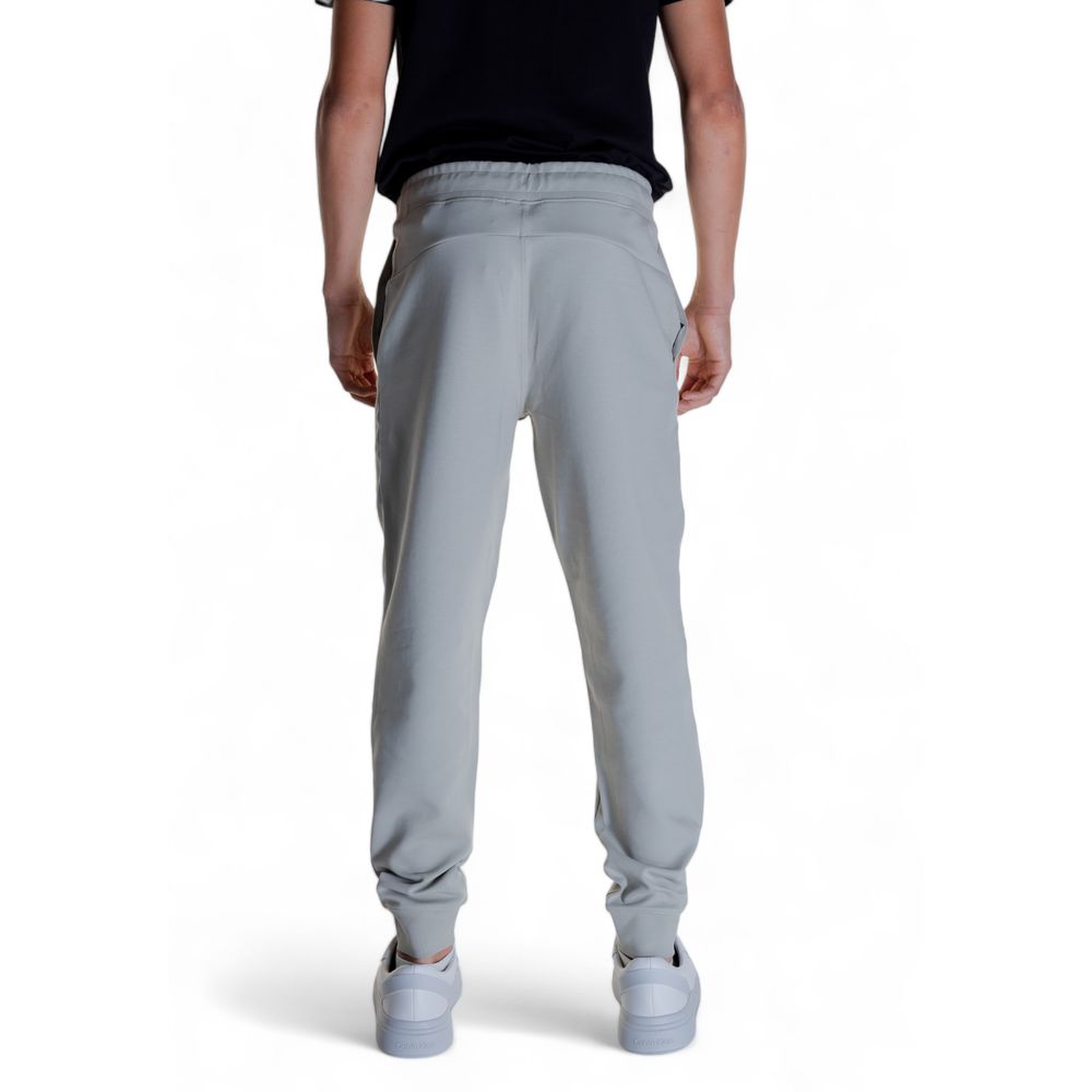 Rear view of Calvin Klein Gray Cotton Joggers (Workout Pants) in gray, perfect for leisure or workouts.