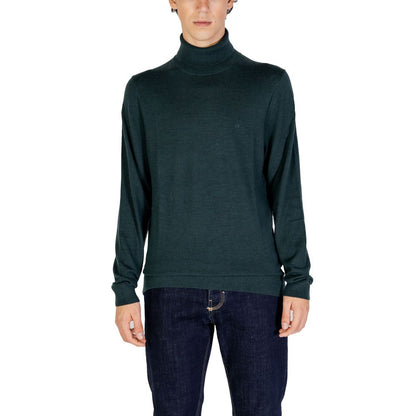 Calvin Klein Green Wool Turtleneck sweater for men, made from 100% RWS Merino wool, offering comfort and elegance for any occasion.