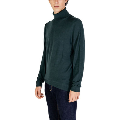 Model wearing Calvin Klein Green Wool Turtleneck for men, showcasing its elegant and versatile design, perfect for casual or formal occasions.