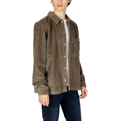 Calvin Klein Jeans Beige Denim Shirt with corduroy texture and chest pocket, styled for a casual look.