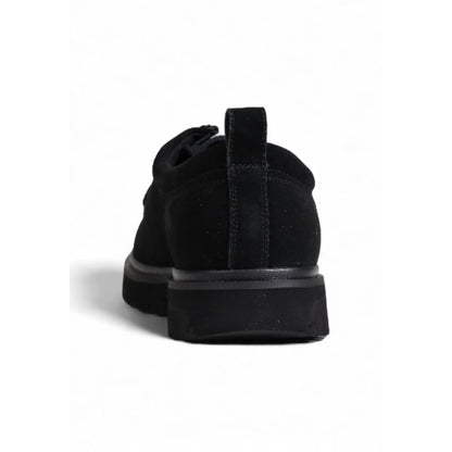 Rear view of Calvin Klein Jeans Black Suede Leather Oxfords And Derbies showcasing the durable ridged sole and stitching details.