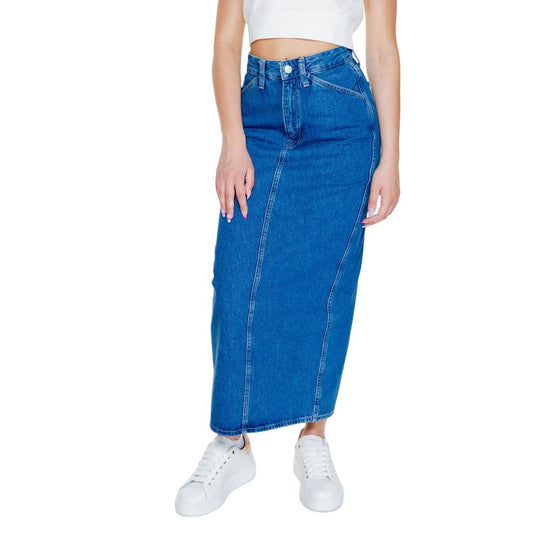 Calvin Klein Jeans Blue Cotton Long Skirt on woman with white top and sneakers, high-waisted, denim with contrast stitching and pockets.