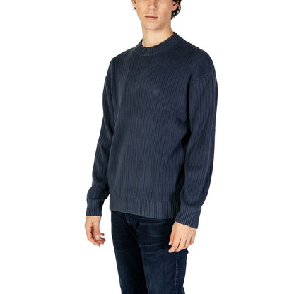 Calvin Klein Jeans Blue Cotton Sweatshirt with vertical ribbed texture, ideal for transitional weather.