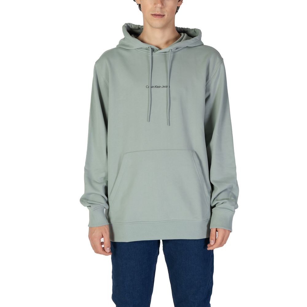 Calvin Klein Jeans Green Cotton Hoodie with logo for men, stylish and comfortable, worn casually. Essential urban fashion garment.