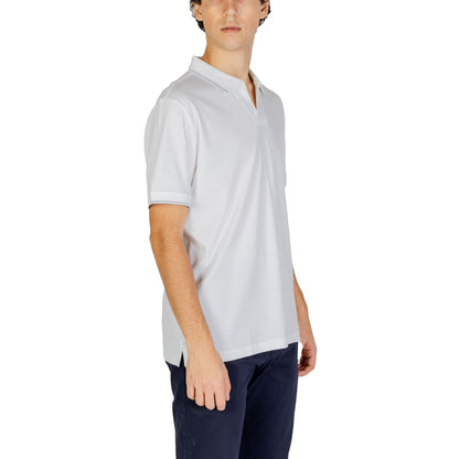 Calvin Klein Jeans White Cotton Polo Shirt on a male model, showcasing a fresh, modern design with open collar and subtle logo on the chest.