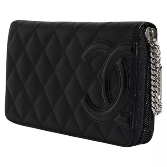 Chanel Black Quilted Leather Logo CC Continental Zip Wallet with bold quilting and embossed logo, perfect for cards and cash storage.