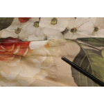 Close-up of Dolce & Gabbana Beige Floral Sleeveless A-line Mini Dress fabric detailing.