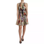 Model wearing Dolce & Gabbana Beige Floral Sleeveless A-line Mini Dress, elegant and charming silk garment for special occasions.