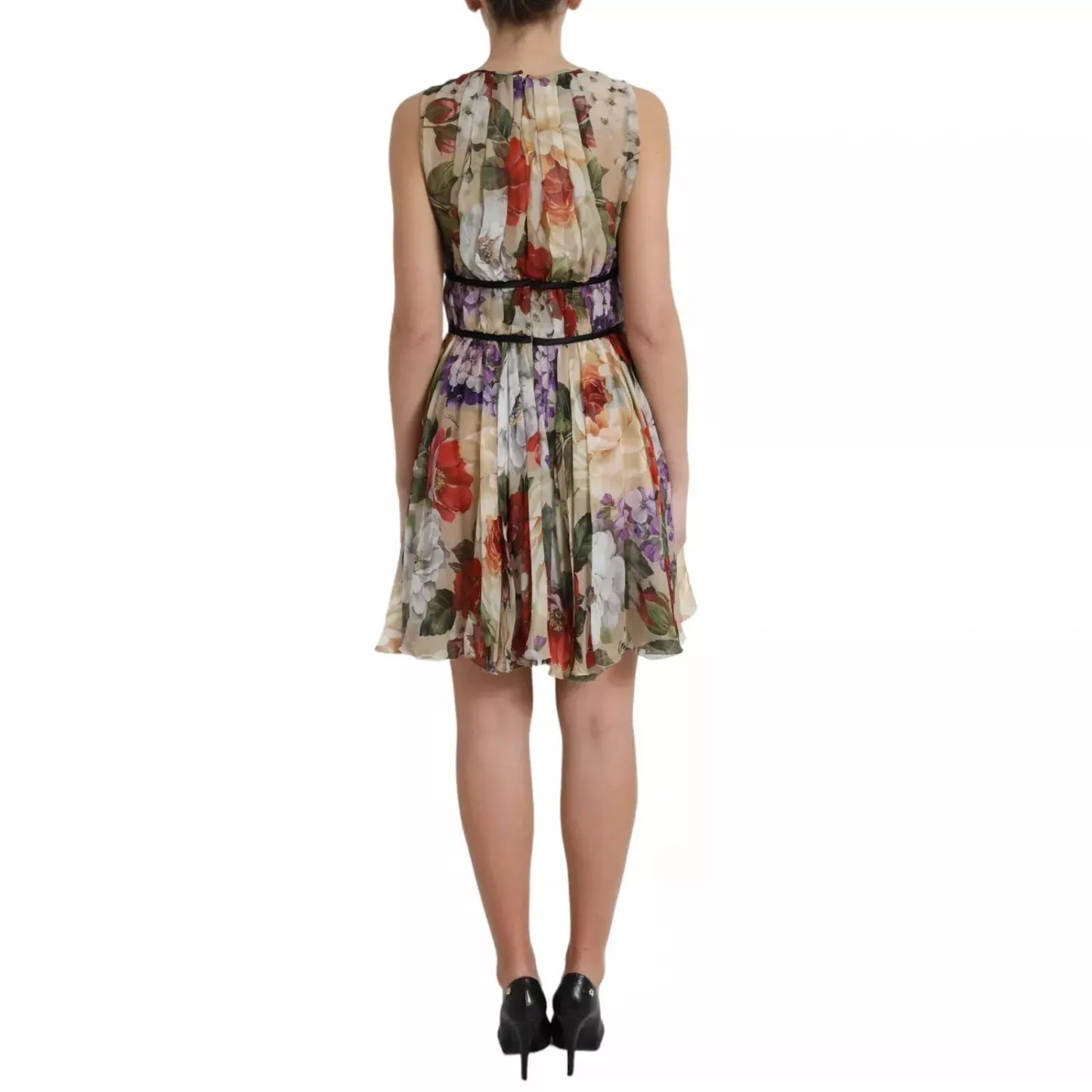 Dolce & Gabbana Beige Floral Sleeveless A-line Mini Dress shown from the back, highlighting floral pattern and elegant fit.