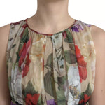 Dolce & Gabbana Beige Floral Sleeveless A-line Mini Dress with silk fabric and elegant floral print, close-up view.