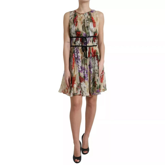 Model wearing Dolce & Gabbana Beige Floral Sleeveless A-line Mini Dress, elegant and charming silk garment for special occasions.