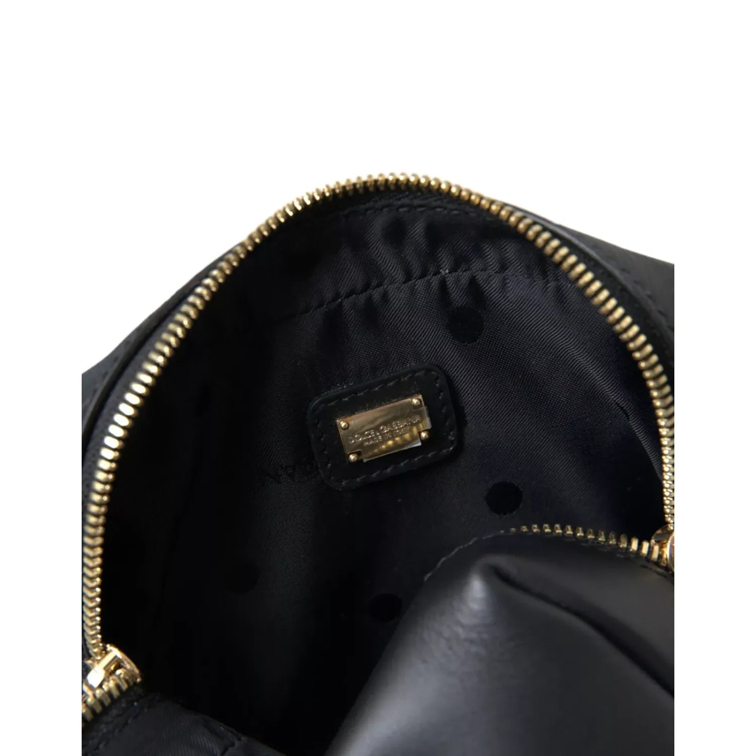 Front view with bag zipped and handles upright.