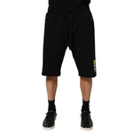 Dolce & Gabbana Black Cotton Mid Waist Casual Bermuda Short with drawstring and logo detailing, perfect for casual outings.