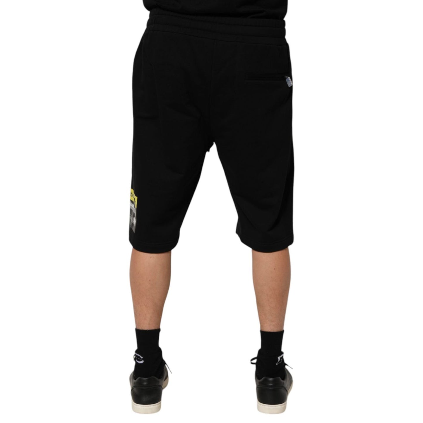 Rear view of Dolce & Gabbana Black Cotton Mid Waist Casual Bermuda Short with logo details, regular fit.