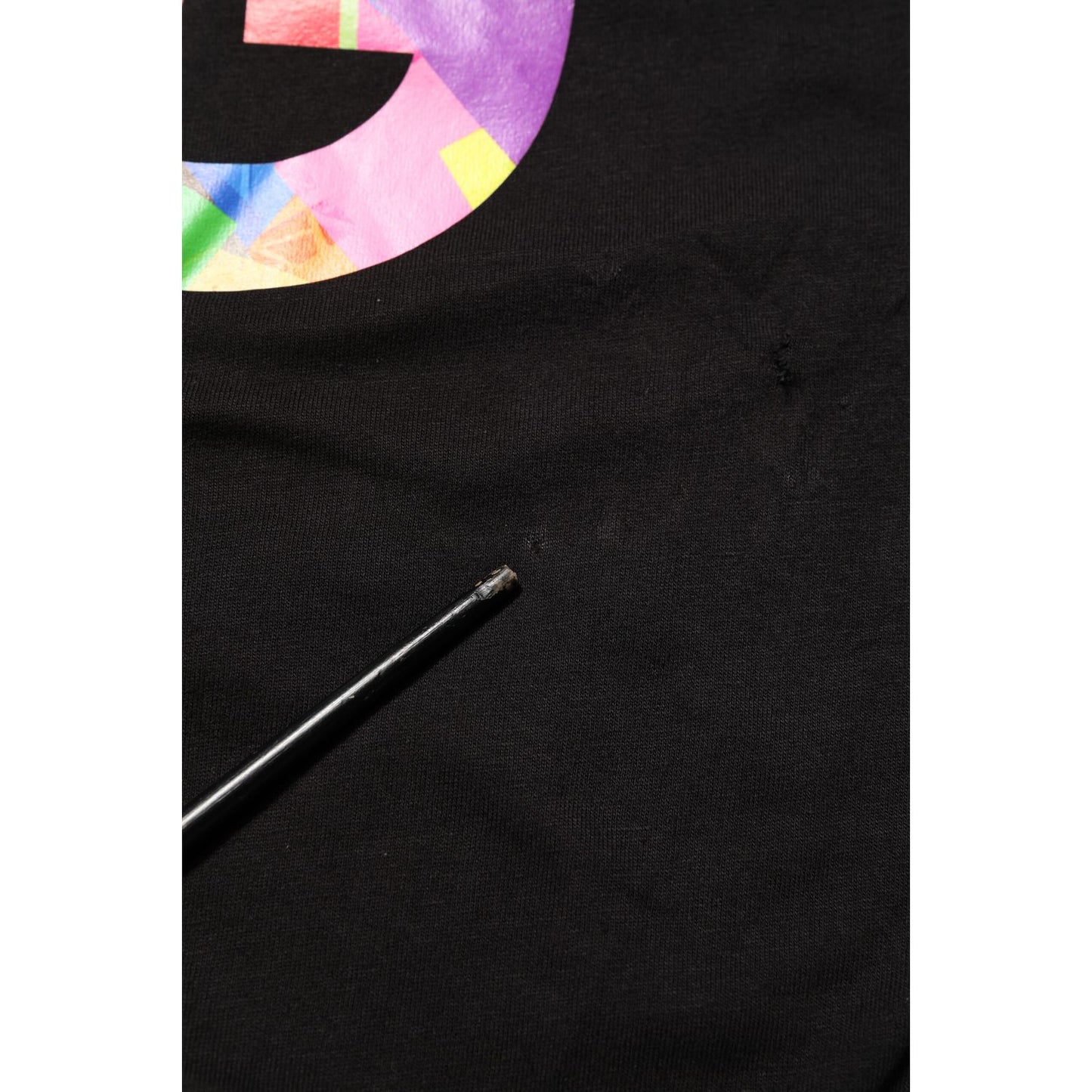 Close-up of Dolce & Gabbana Black Logo Print Cotton Crew Neck T-shirt showcasing colorful logo detail on premium cotton fabric.