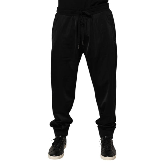Dolce & Gabbana Black Polyester Logo Plaque Sweatpants Jogger Pants with drawstring closure and side pockets for stylish casual wear.
