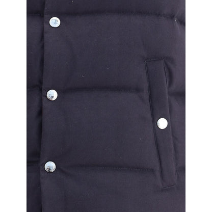 Close-up of Dolce & Gabbana Blue Cotton Jackets And Coat with snap button closure and quilted design.