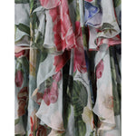 Close-up of Dolce & Gabbana Blue Floral Print Tiered Long Maxi Dress fabric with colorful floral designs and tiered layers.